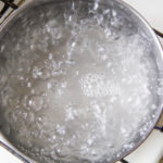 Pot full of boiling water on the stove