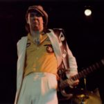 Stevie_Ray_Vaughan_Ritz_-_behind_the_back_-_making_a_face-Wikimedia-Commons-768×511