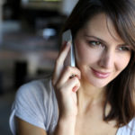 Portrait of attractive woman talking on mobile phone