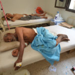 People infected with cholera lie on beds at a hospital in the Red Sea port city of Hodeidah, Yemen